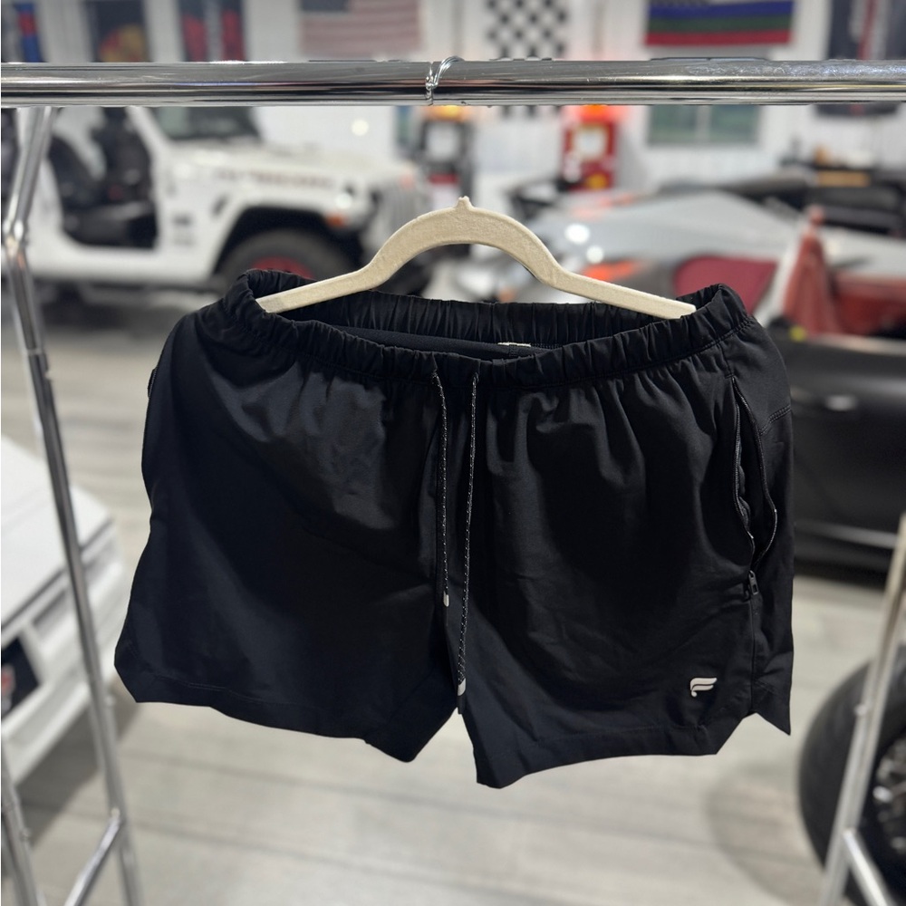 Black Nike Shorts with Elastic Waistband and Lightweight Fabric